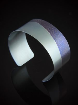 slow swirl wide titanium cuff