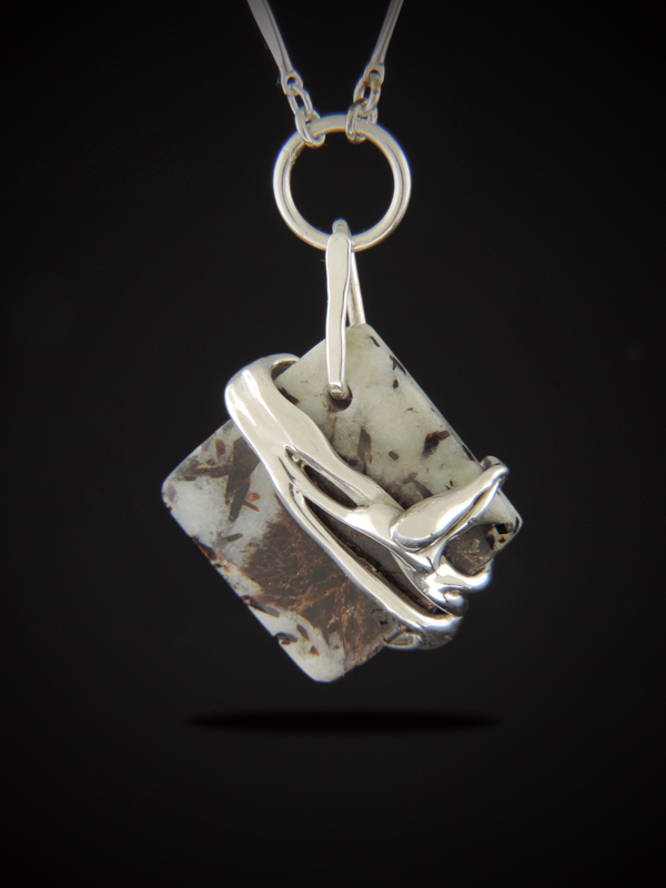 Square Astrophyllite stone with chocolate-brown inclusions, featuring a "liquid" cast sterling silver overlay and custom bail on a link chain.
