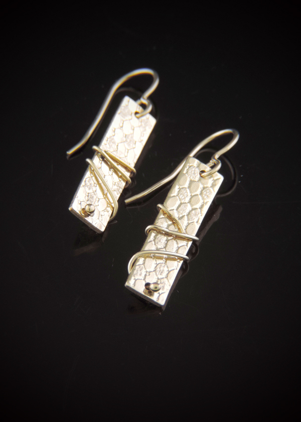 Pair of gold-filled rectangular tab earrings with a mesh-textured surface and decorative wire wrapping on gold-filled hooks.