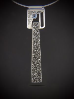 Long rectangular black knight druzy pendant with an art deco sterling silver top and a round blue kyanite accent on a sterling omega chain