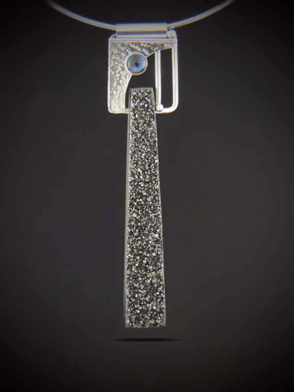 Long rectangular black knight druzy pendant with an art deco sterling silver top and a round blue kyanite accent on a sterling omega chain