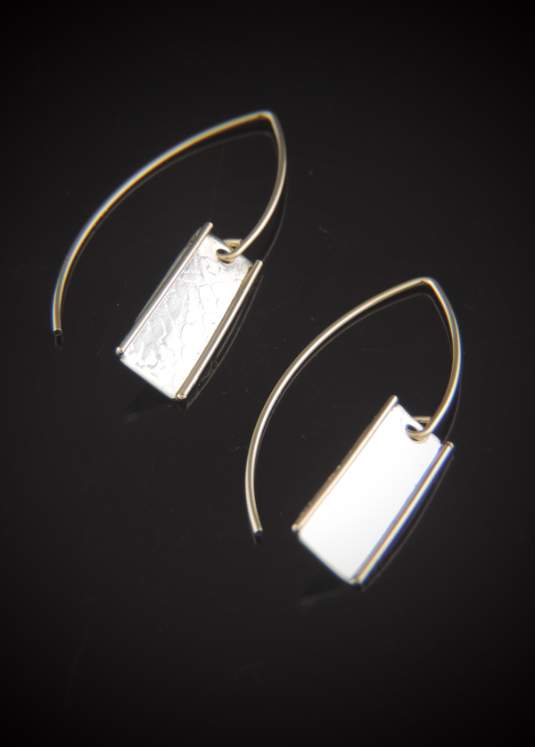Limoncello Spritz drop earrings featuring textured sterling silver rectangular dangles with gold-filled wire side accents hanging on gold-filled ear wires.